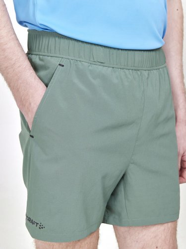 CRAFT ADV Essence 2v1 Shorts light green - Velikost: L